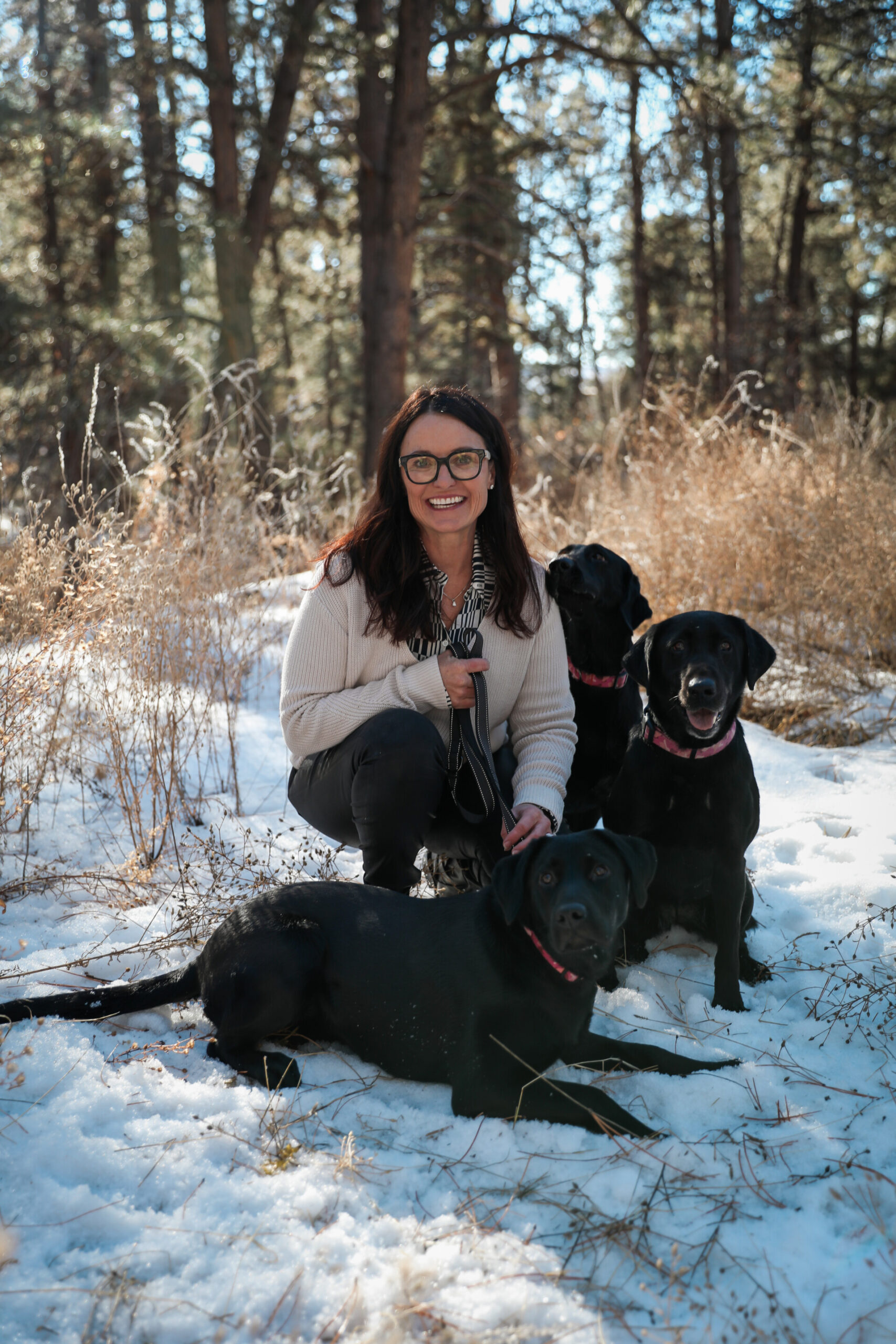 Dr. Cindy playing with her dogs